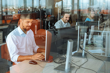 People working at a help desk as a service